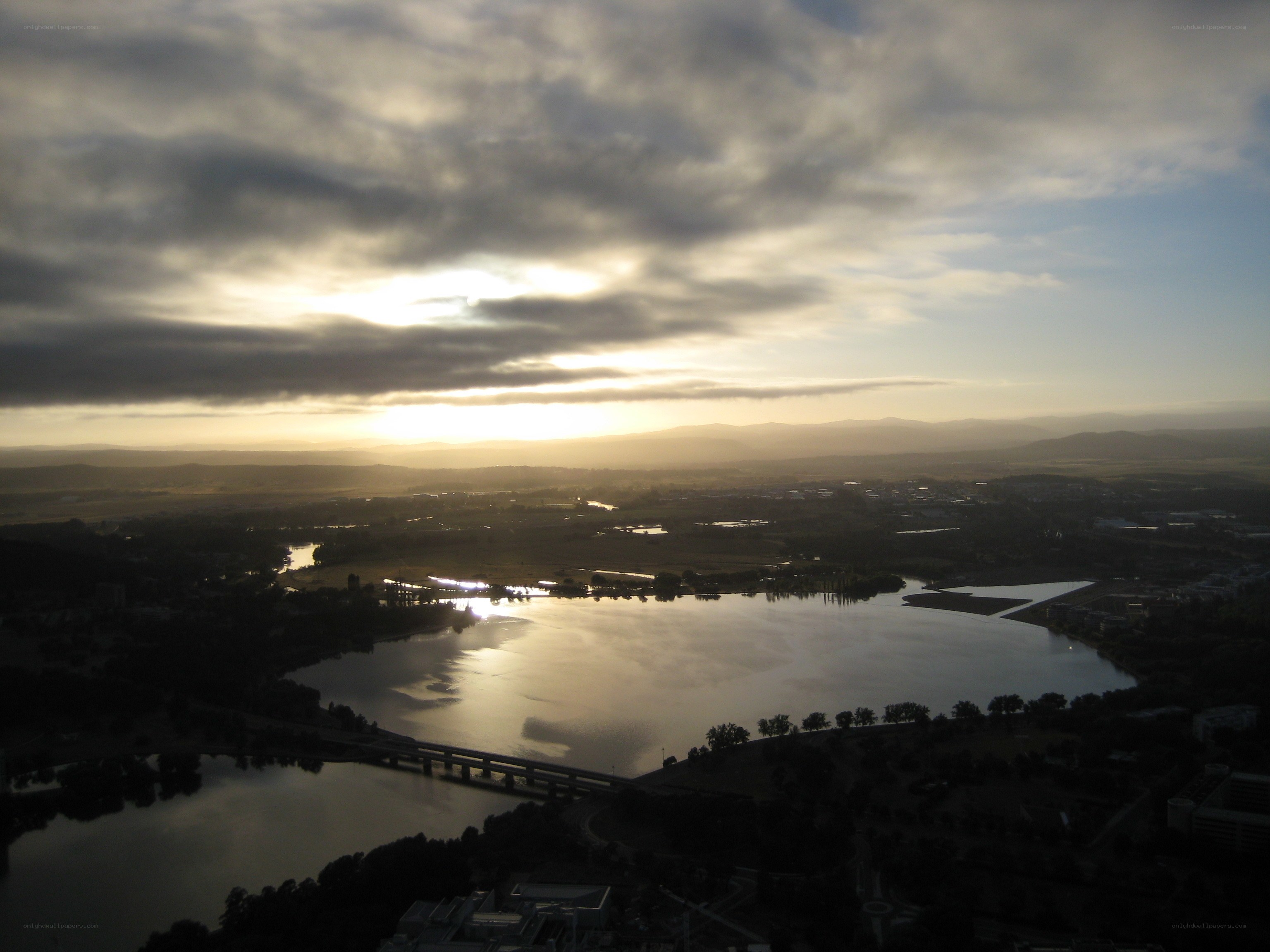 sunset over a river valley