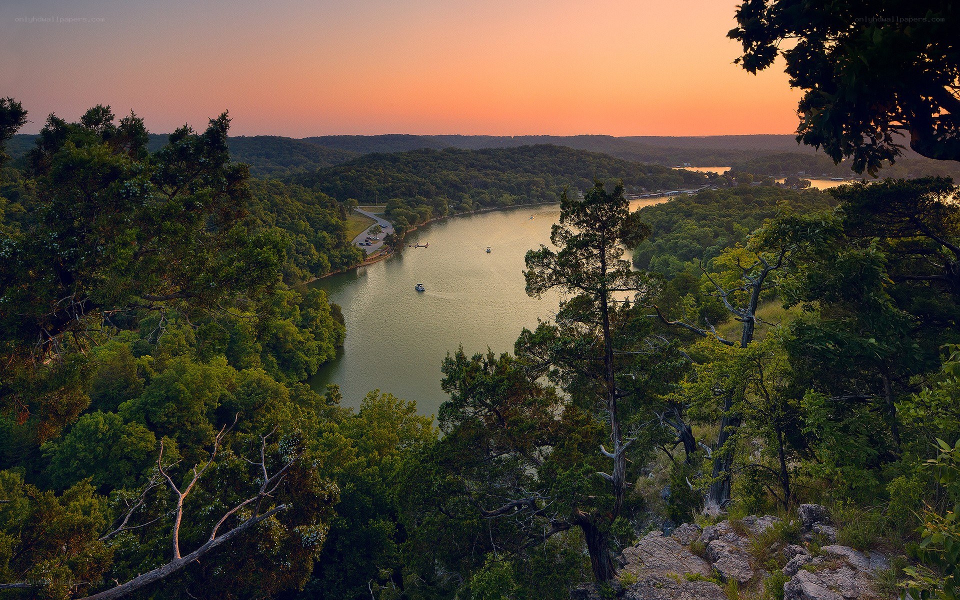 sunset over a river valley