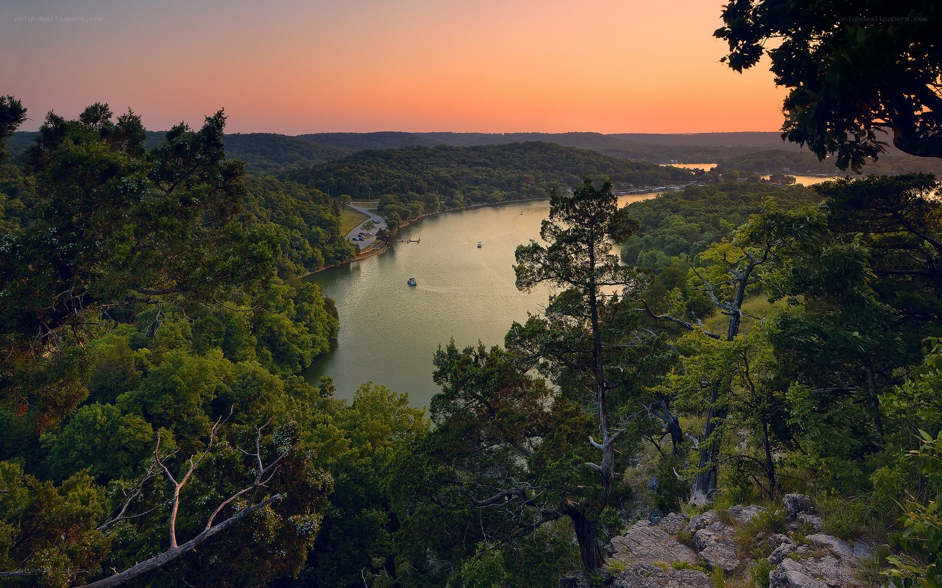sunset over a river valley