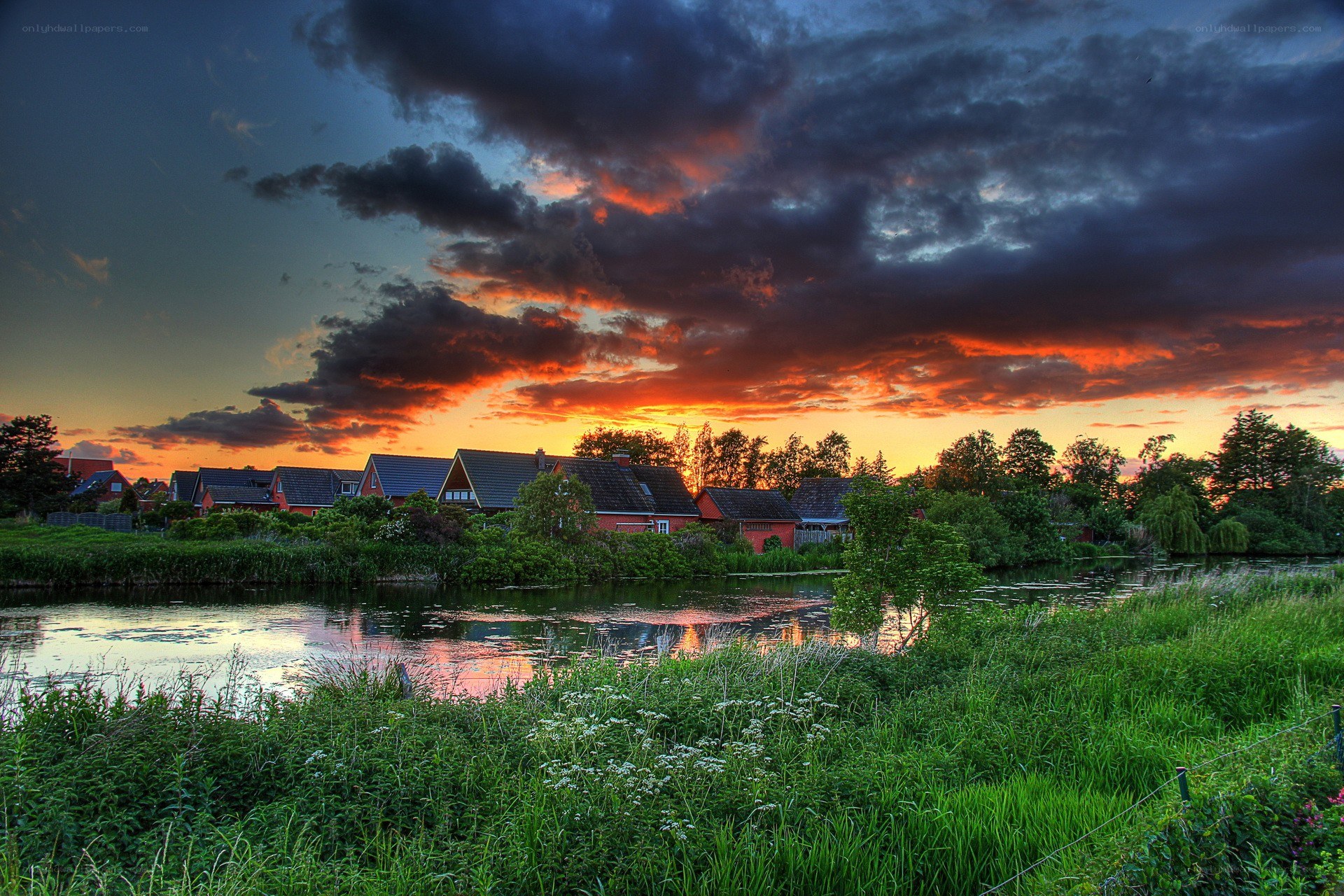 Sunset over a riverside village