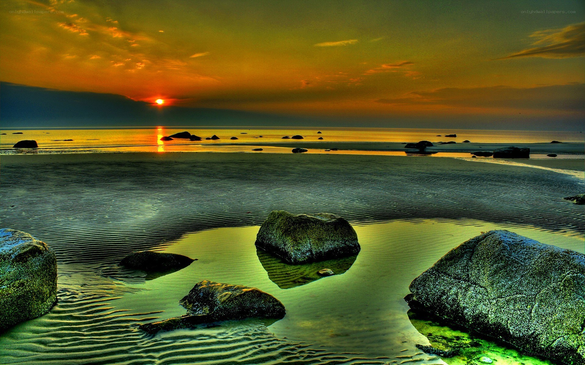 Sunset over a rocky beach