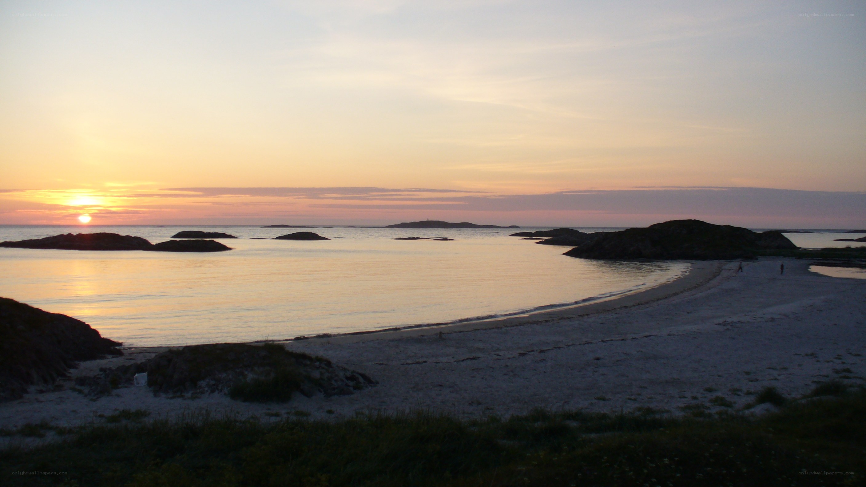 sunset over a rocky beach