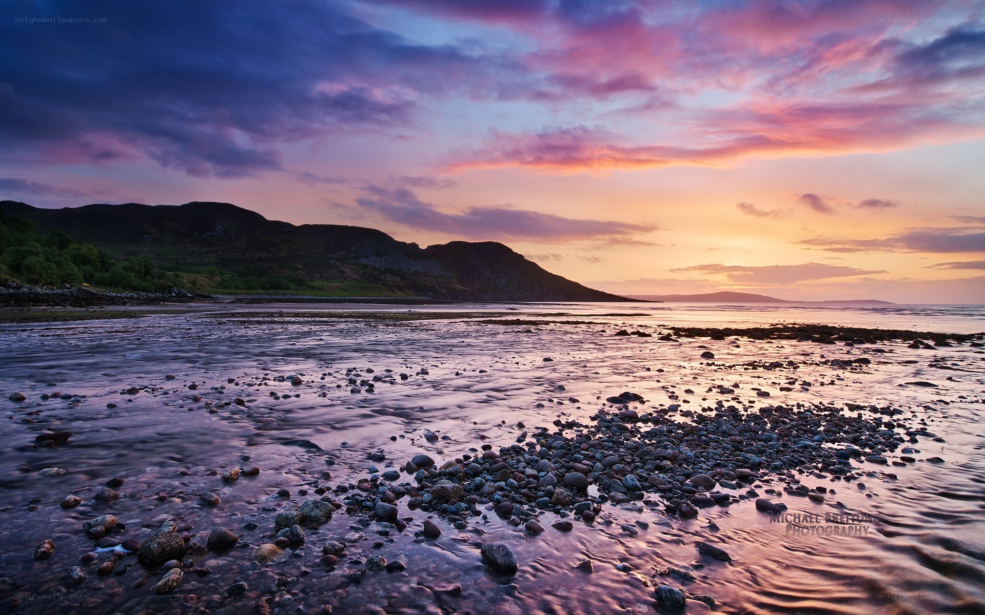 Sunset over a rocky beach