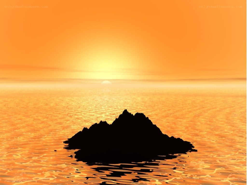 sunset over a rocky island