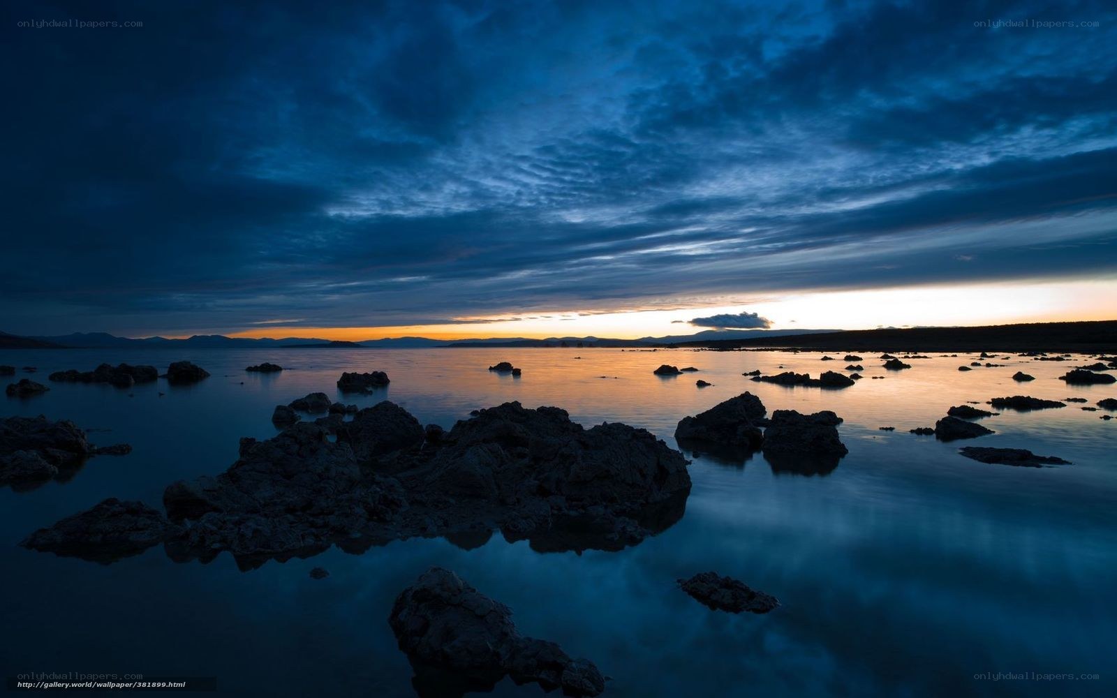 Sunset over a rocky lake