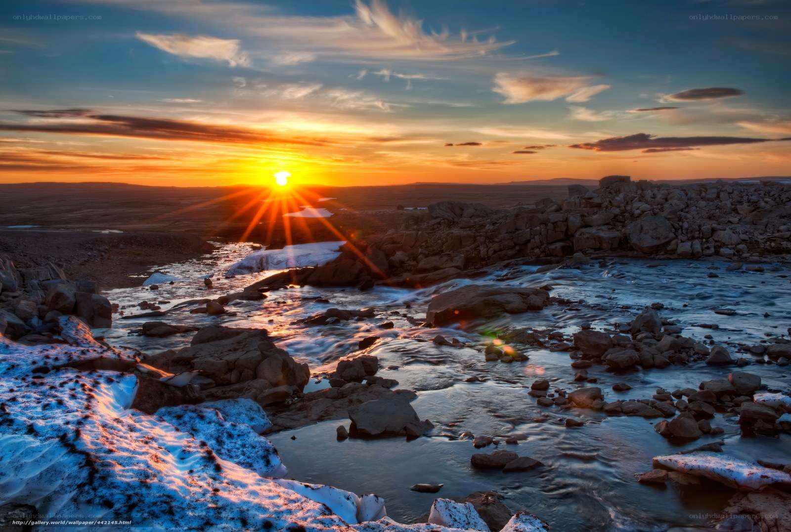 Sunset over a rocky river
