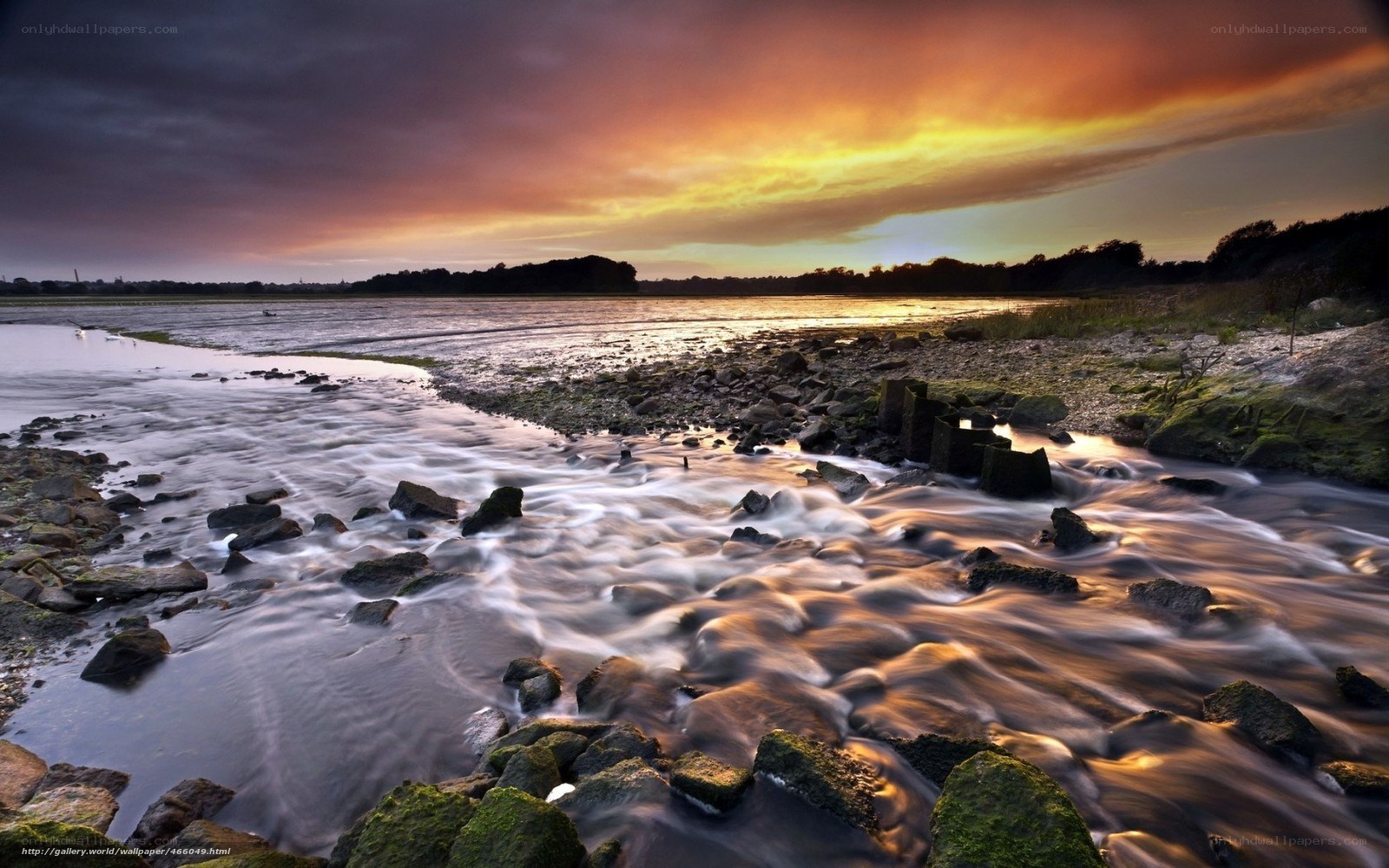Sunset over a rocky river