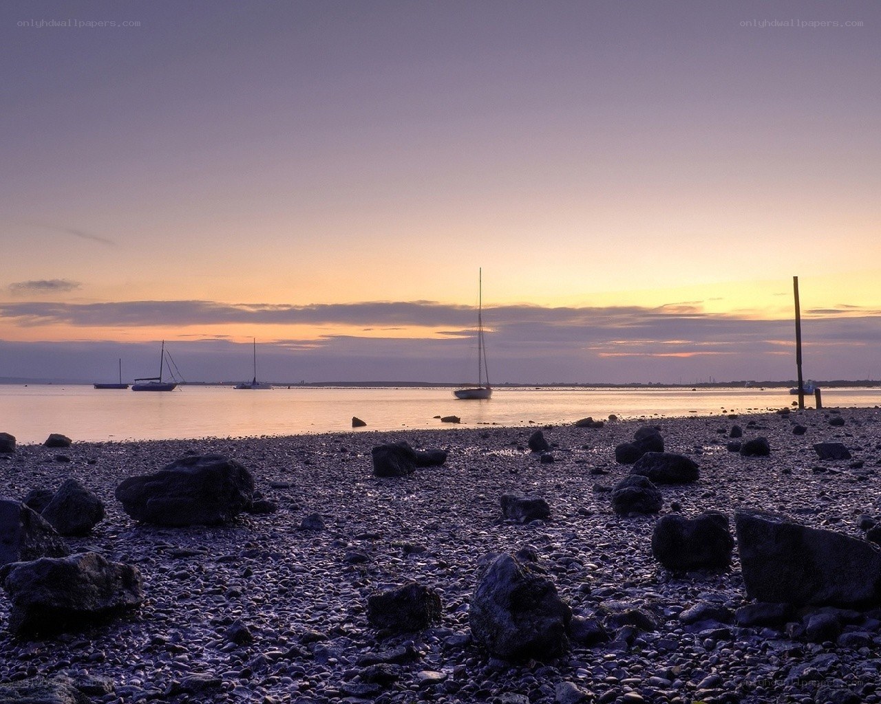 sunset over a rocky shore