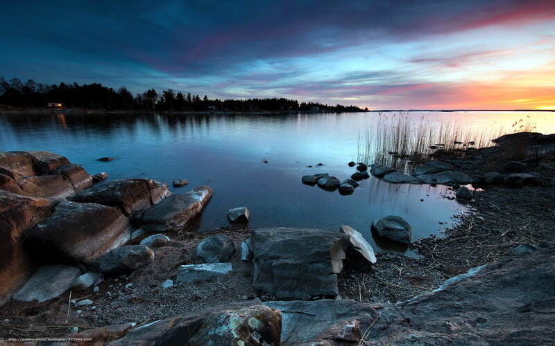 Sunset over a rocky shoreline