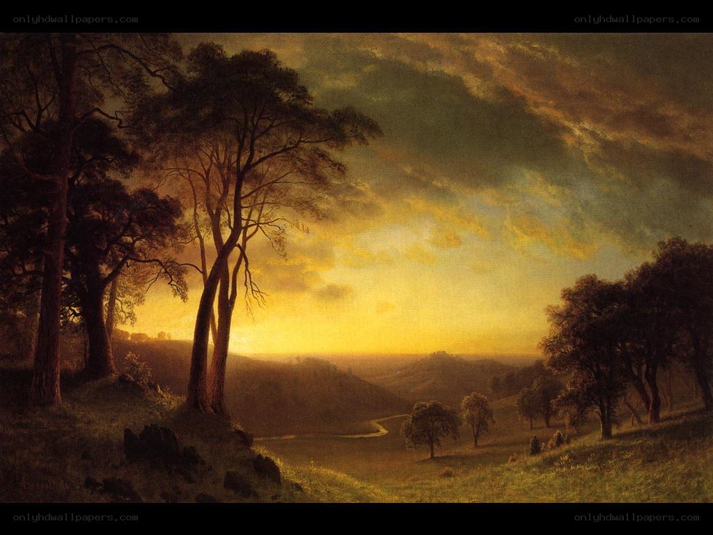 Sunset over a rolling landscape