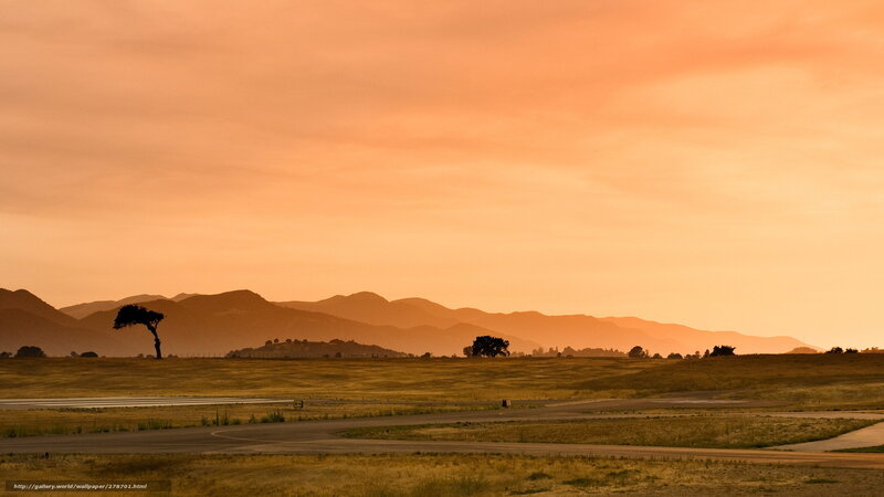 Sunset over a rural airfield