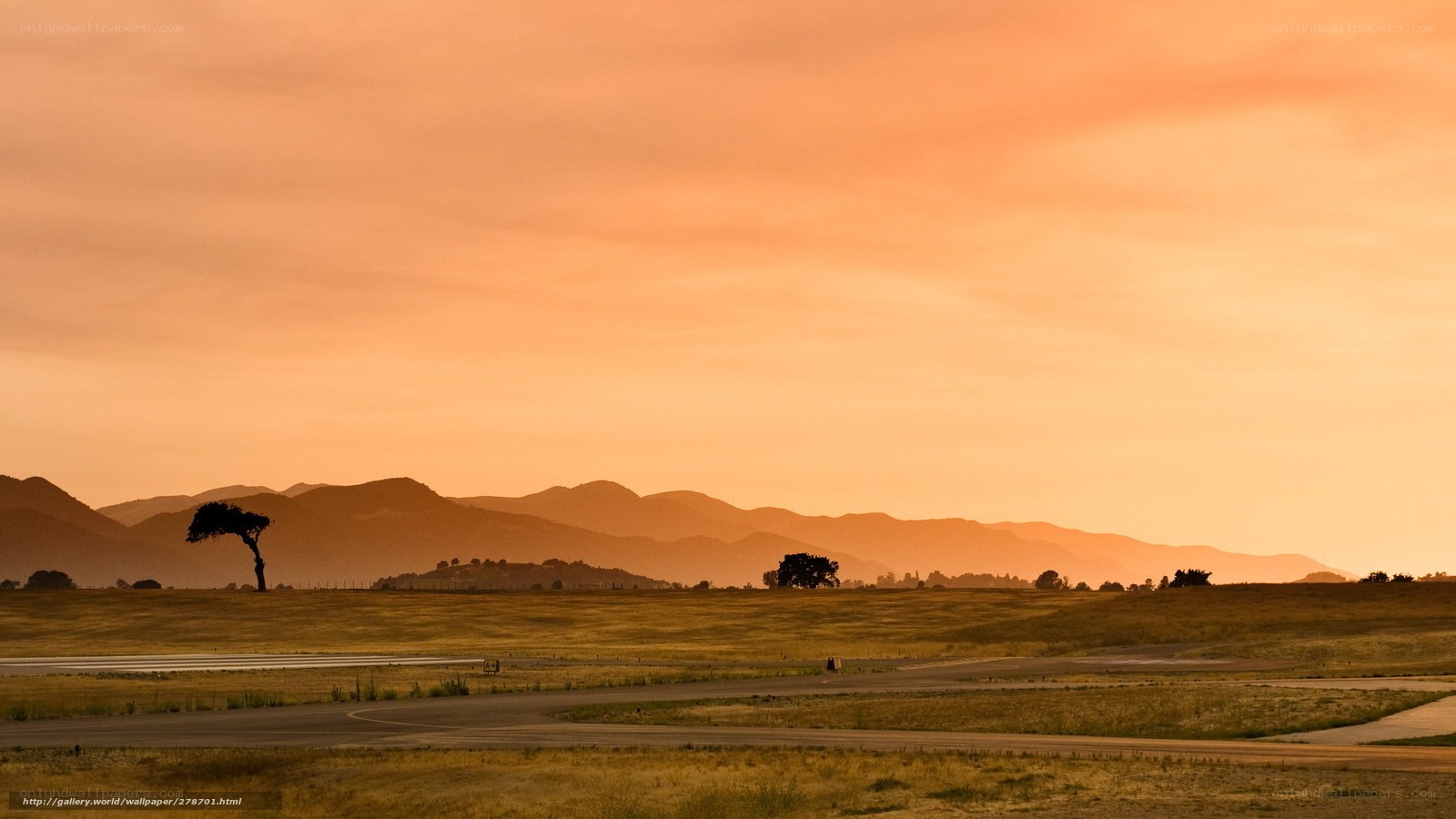 Sunset over a rural airfield