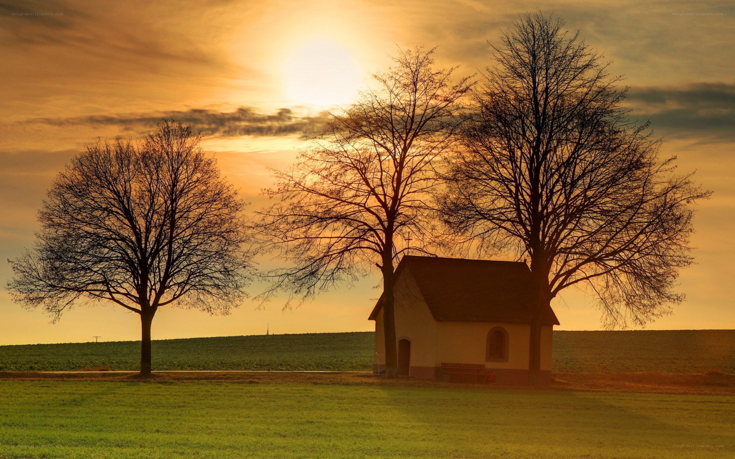 Sunset over a rural chapel