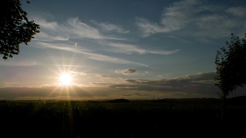 Sunset over a rural field