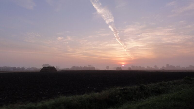 sunset over a rural field