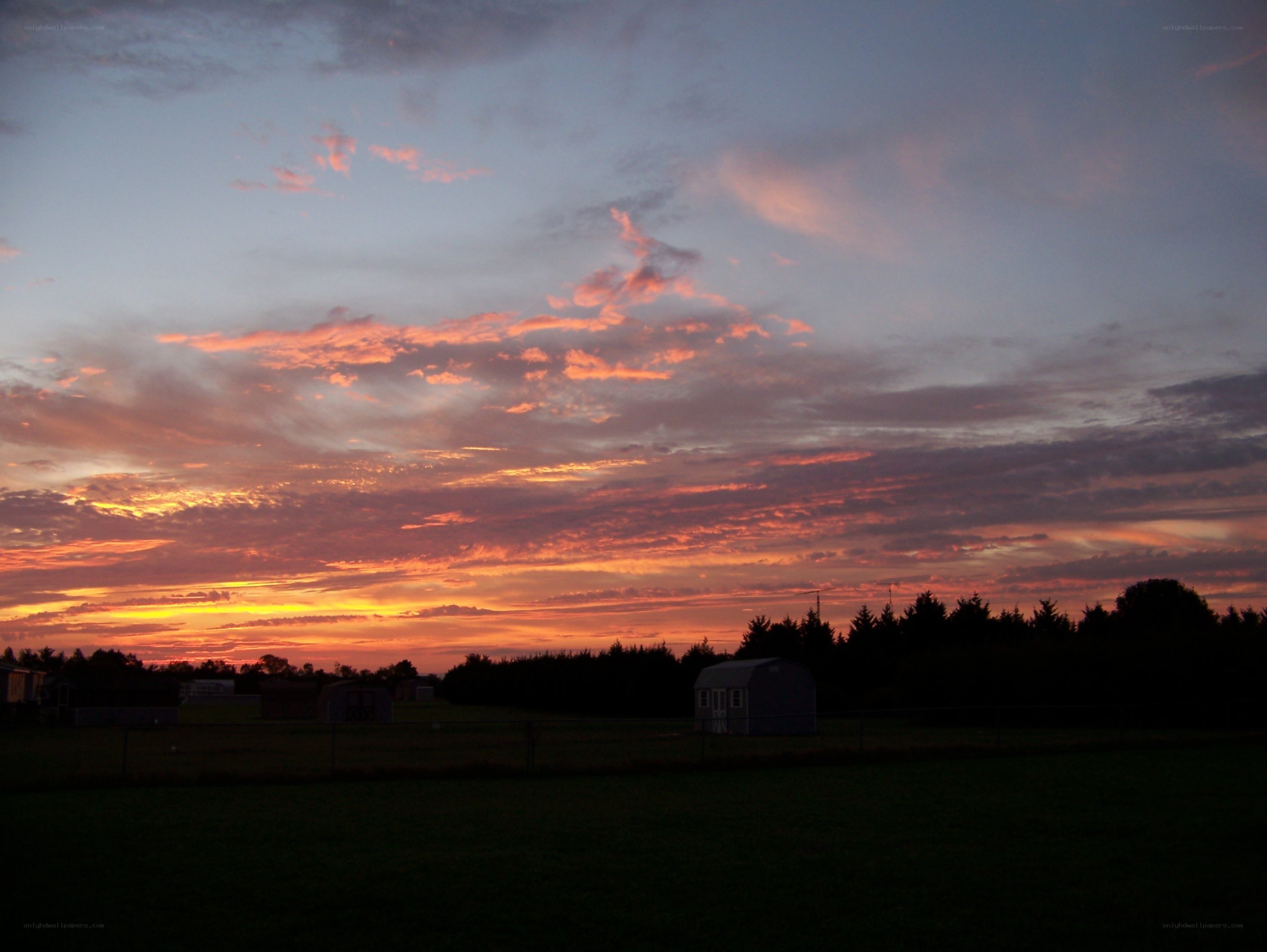 sunset over a rural field