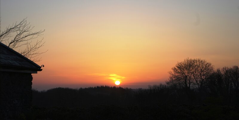 sunset over a rural landscape