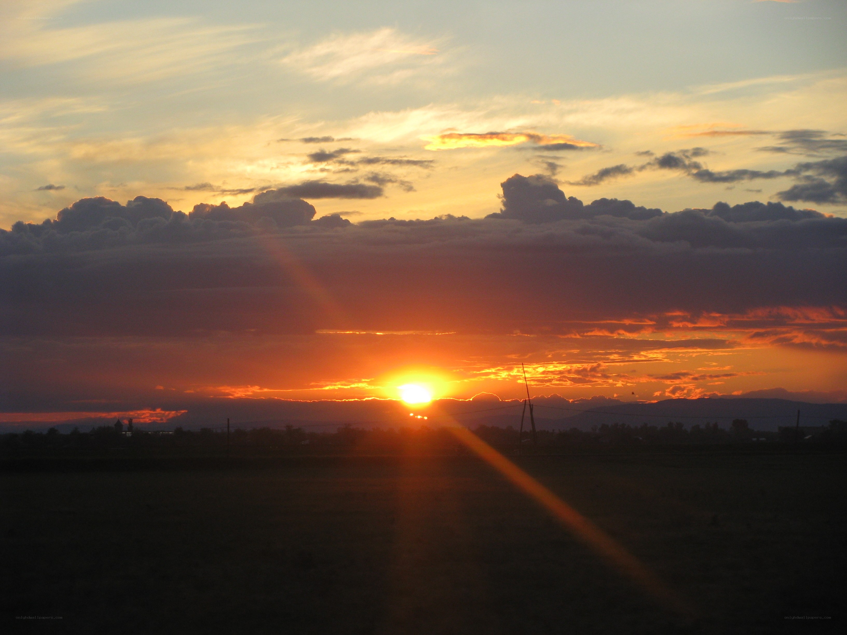 sunset over a rural landscape