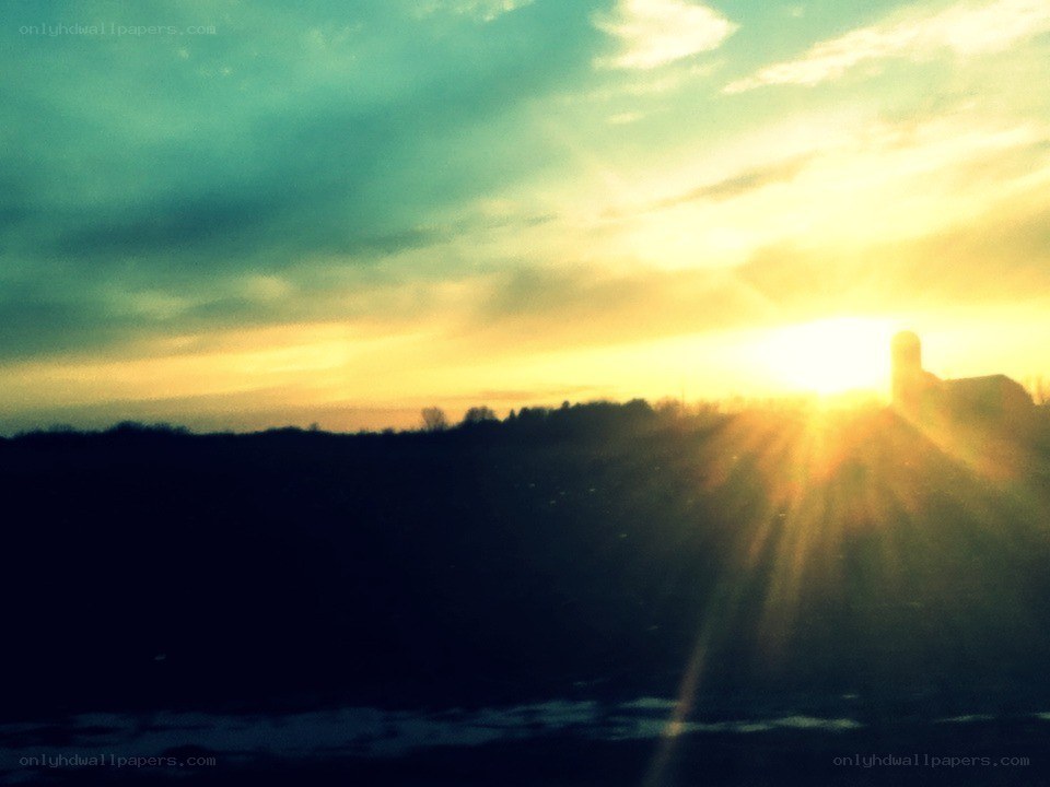 sunset over a rural landscape