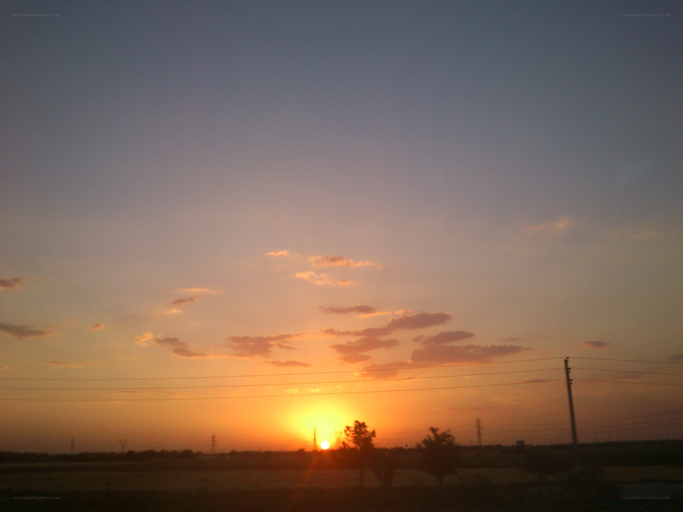 sunset over a rural landscape
