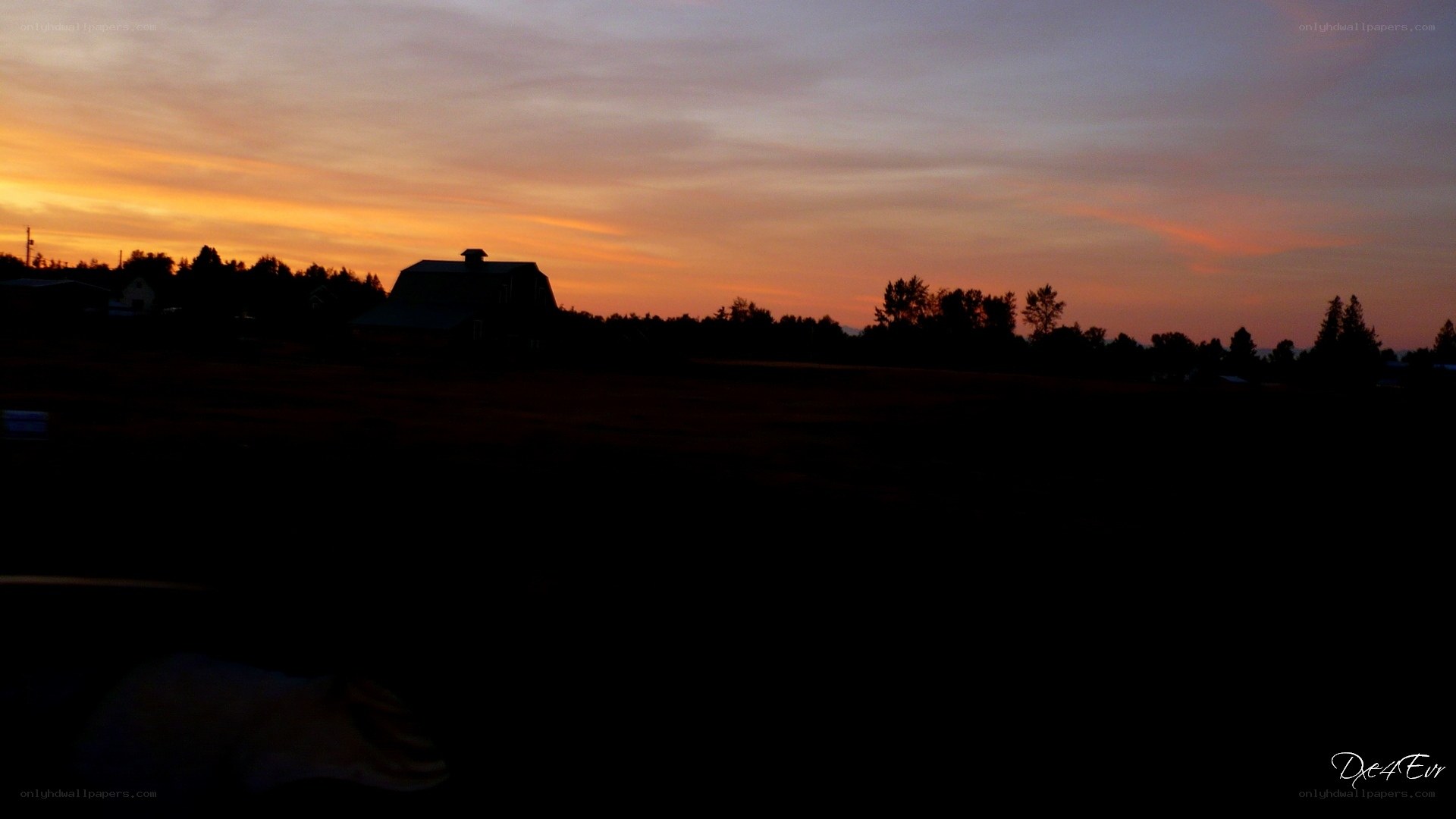 sunset over a rural landscape