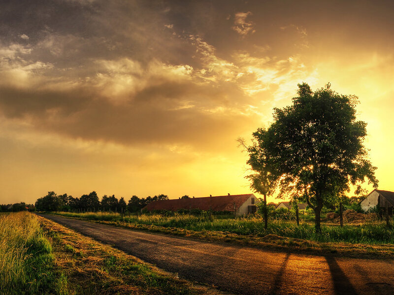 Sunset over a rural road
