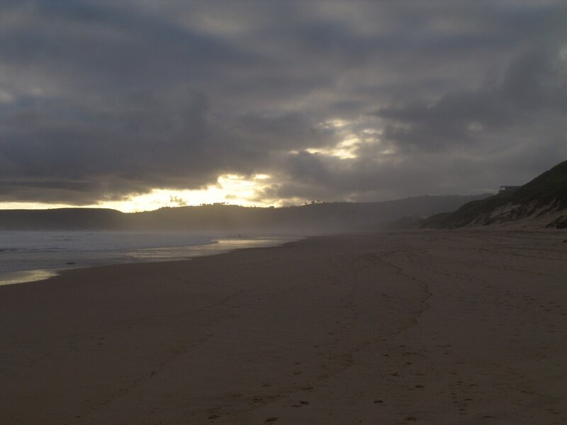 sunset over a sandy beach