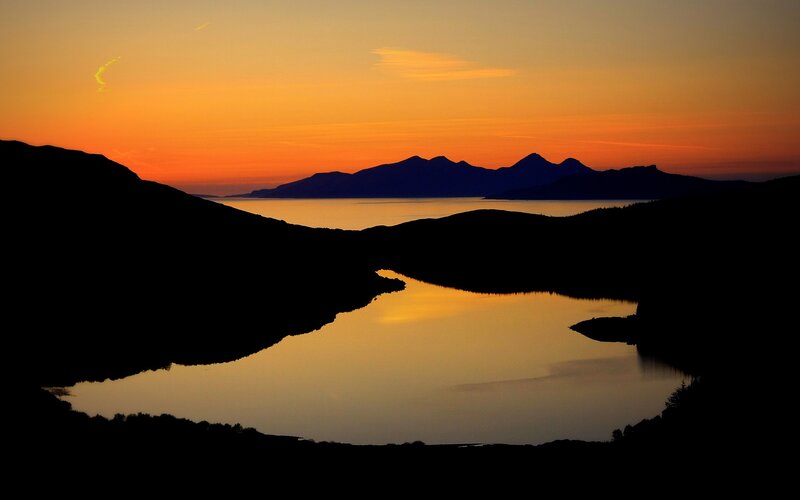 sunset over a Scottish loch