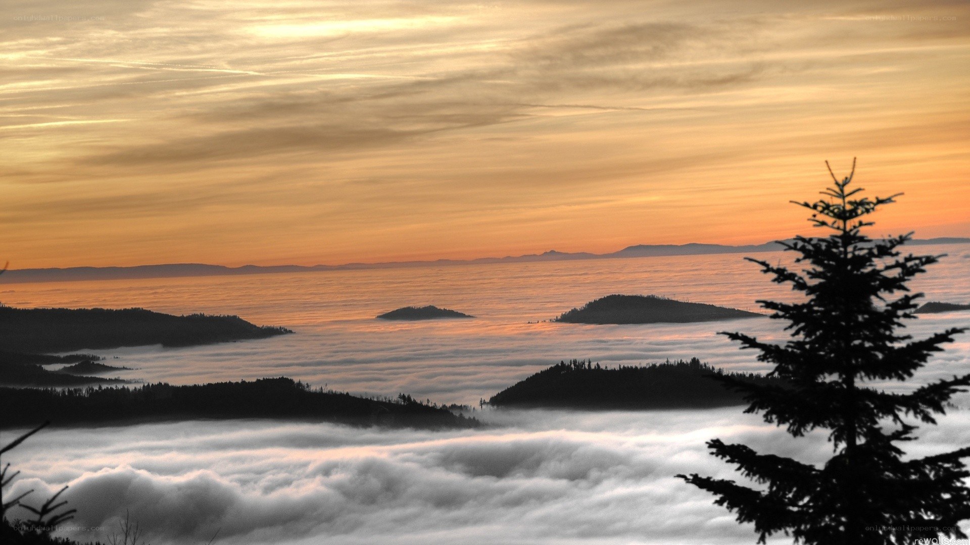 Sunset over a sea of clouds