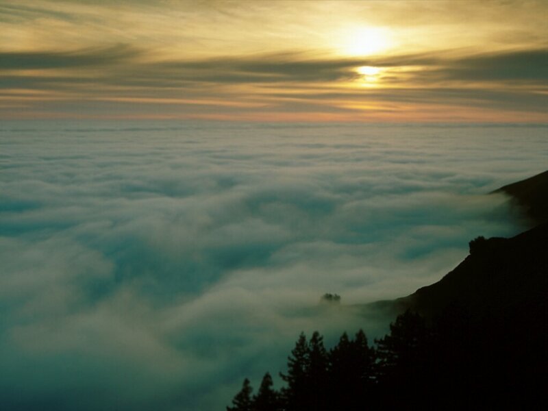 Sunset over a sea of clouds