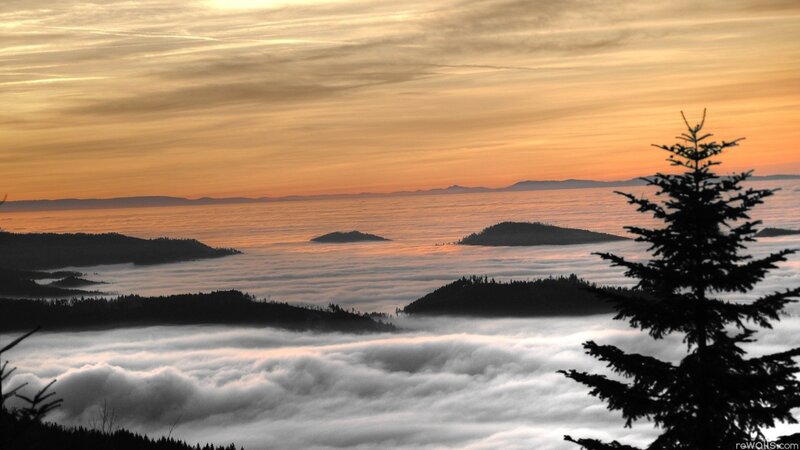 Sunset over a sea of clouds