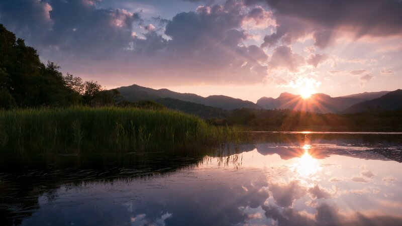 Sunset over a serene lake