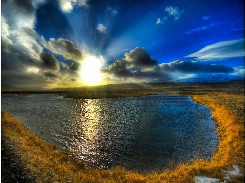 Sunset over a serene lake