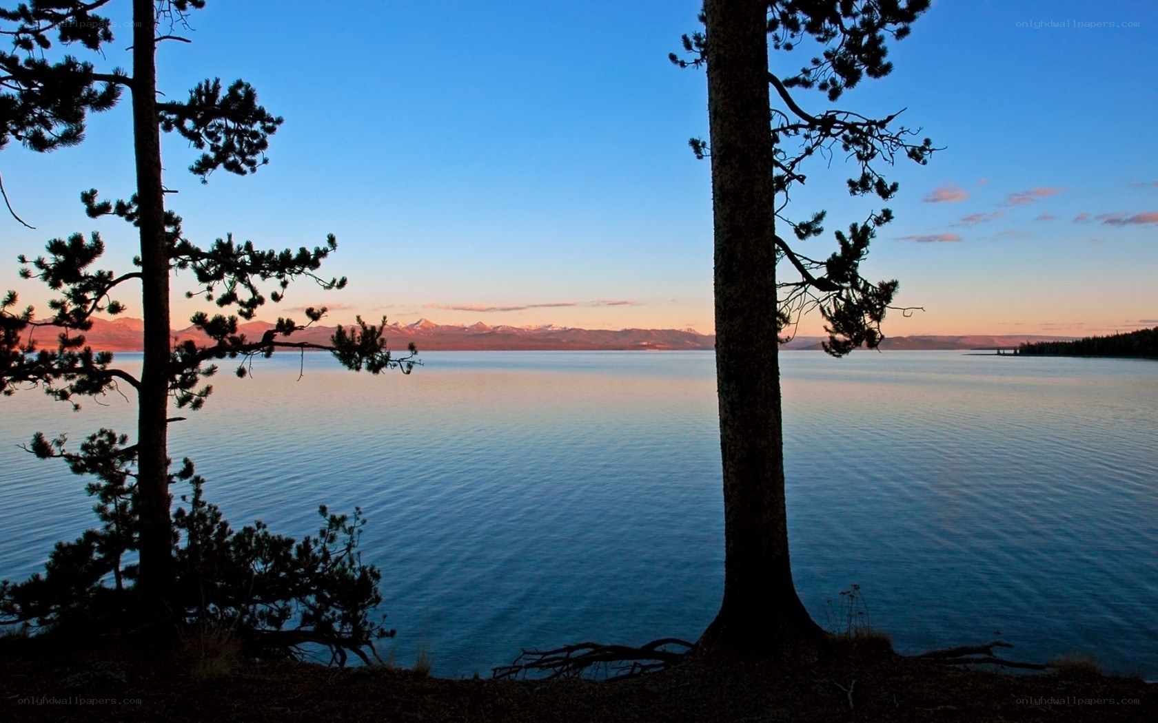 Sunset over a serene lake