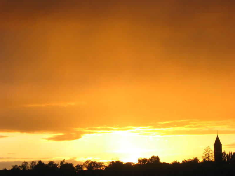 Sunset over a silhouetted town