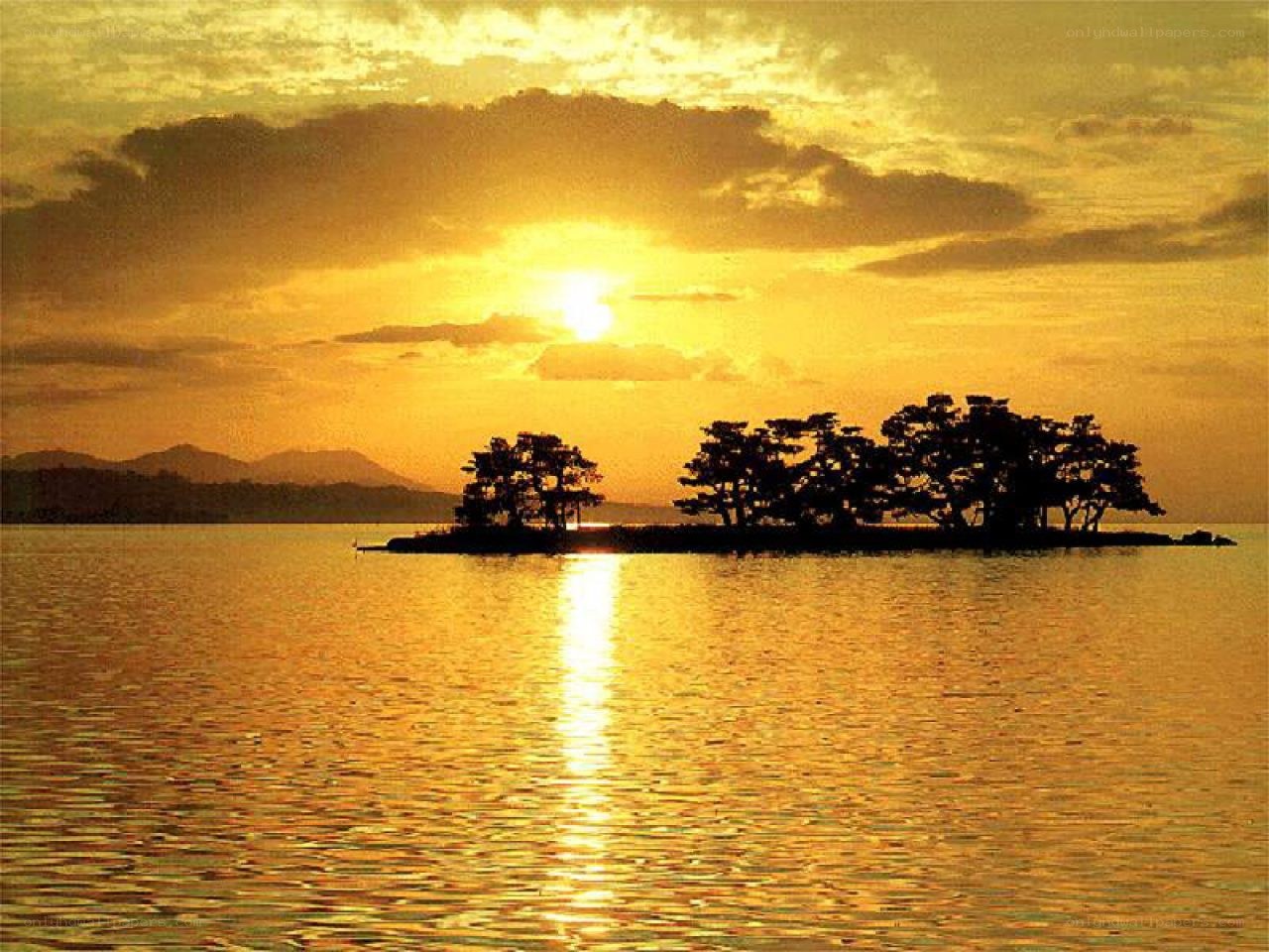 Sunset over a small island