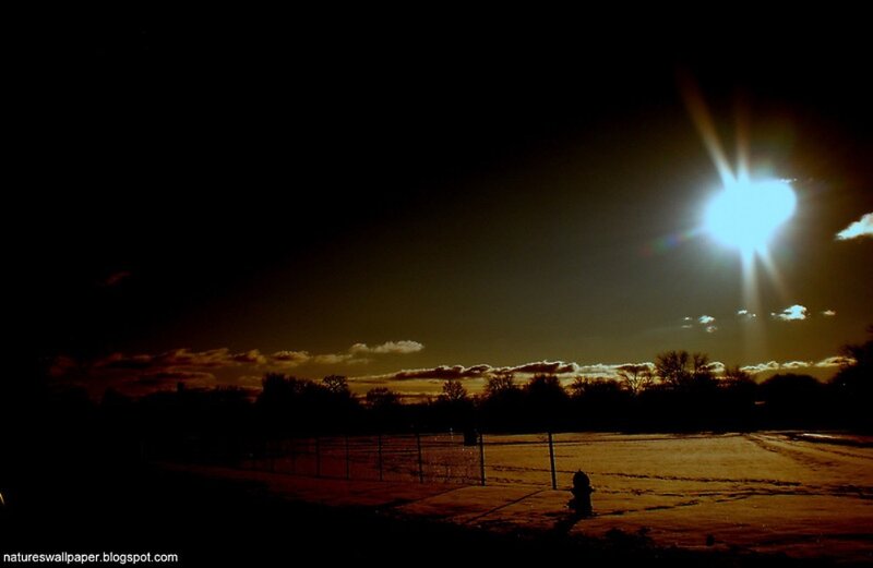 Sunset over a snowy field