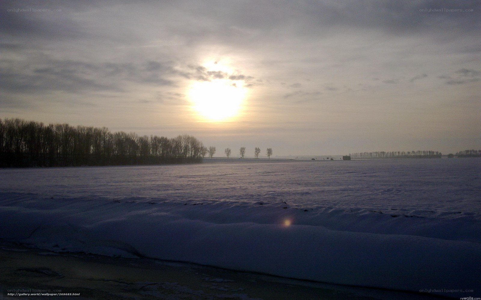 Sunset over a snowy field