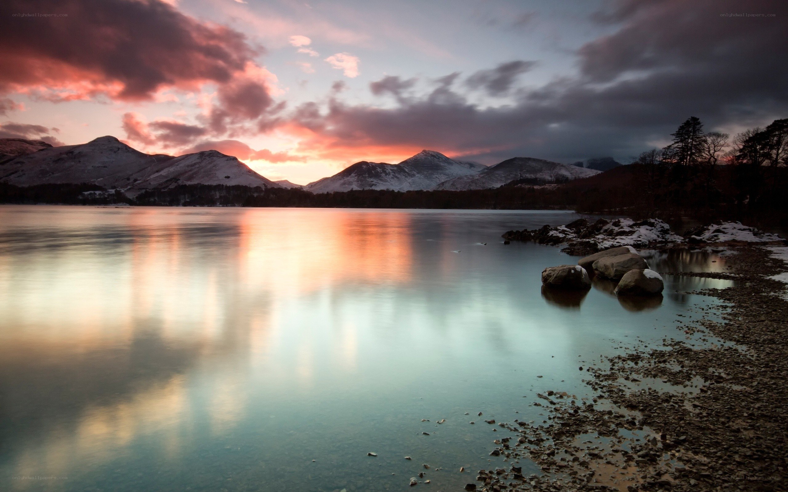Sunset over a snowy lake