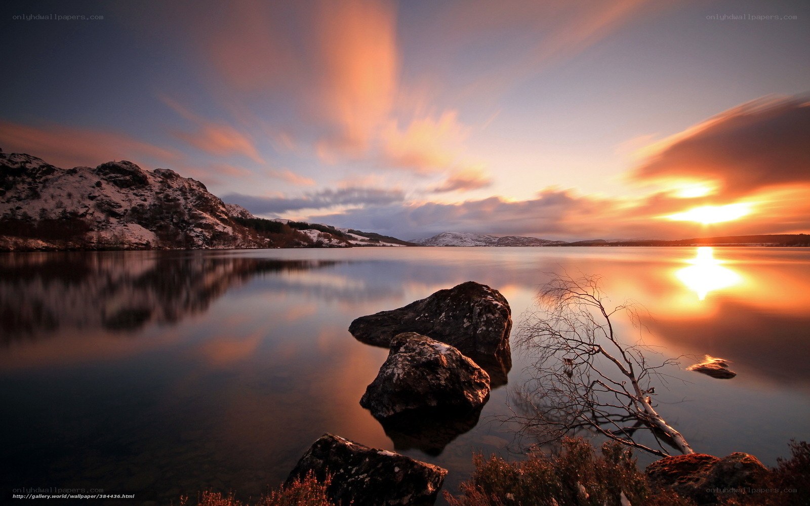Sunset over a snowy lake