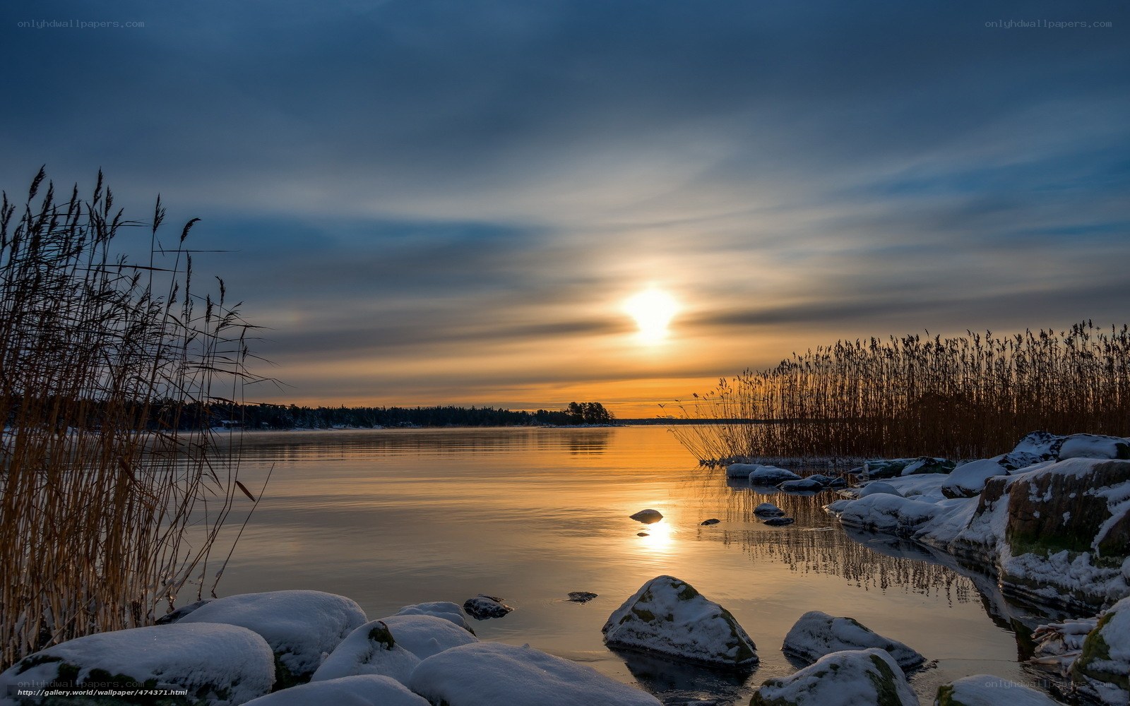 Sunset over a snowy lake