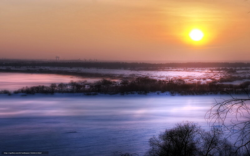 Sunset over a snowy landscape