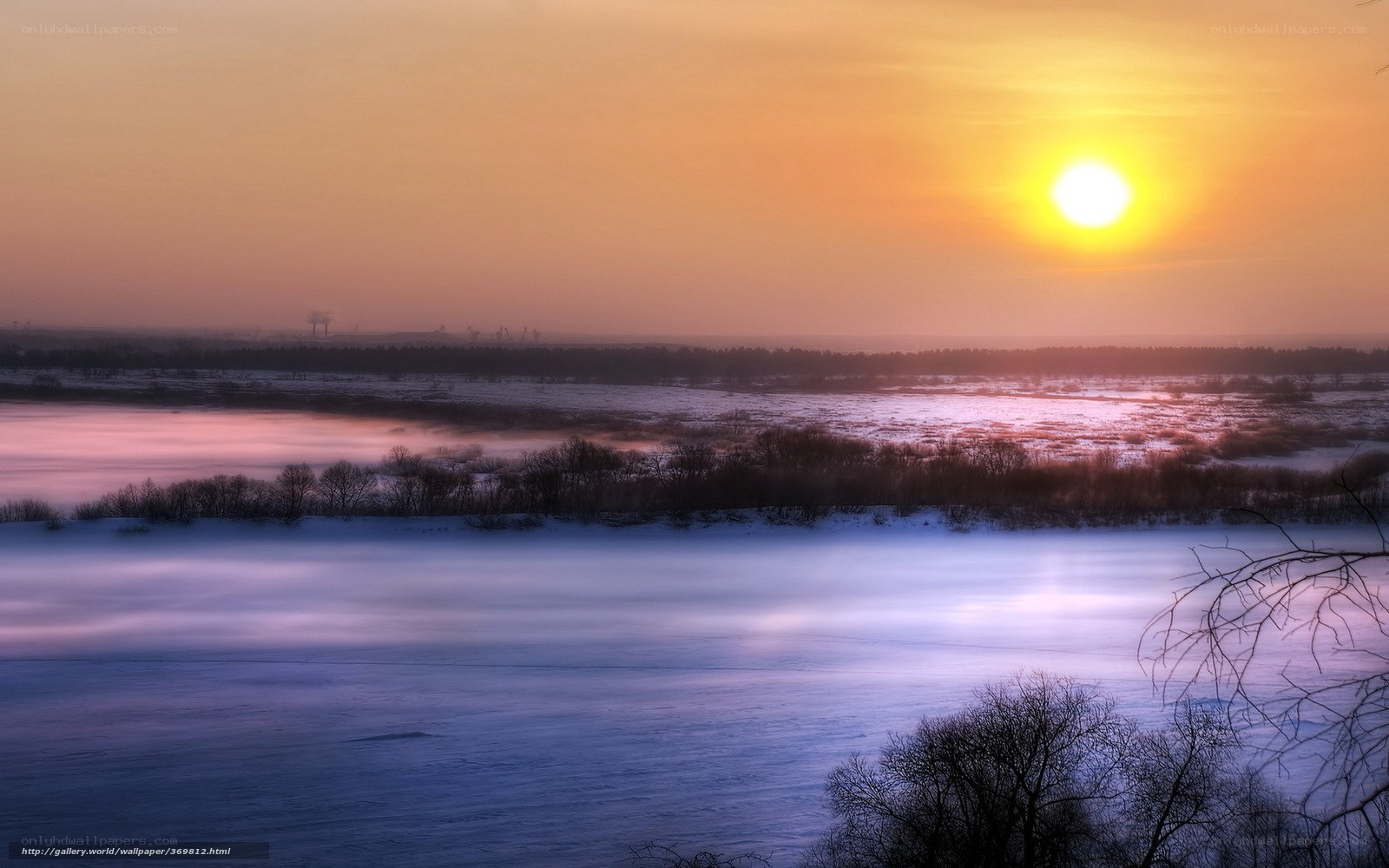 Sunset over a snowy landscape