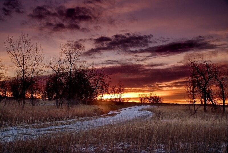 Sunset over a snowy path