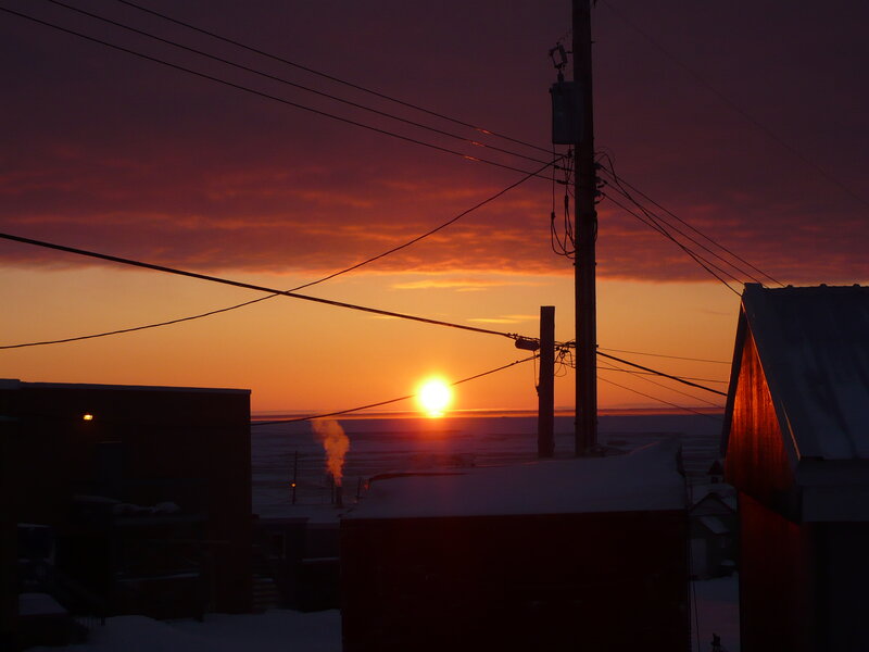 Sunset over a snowy town