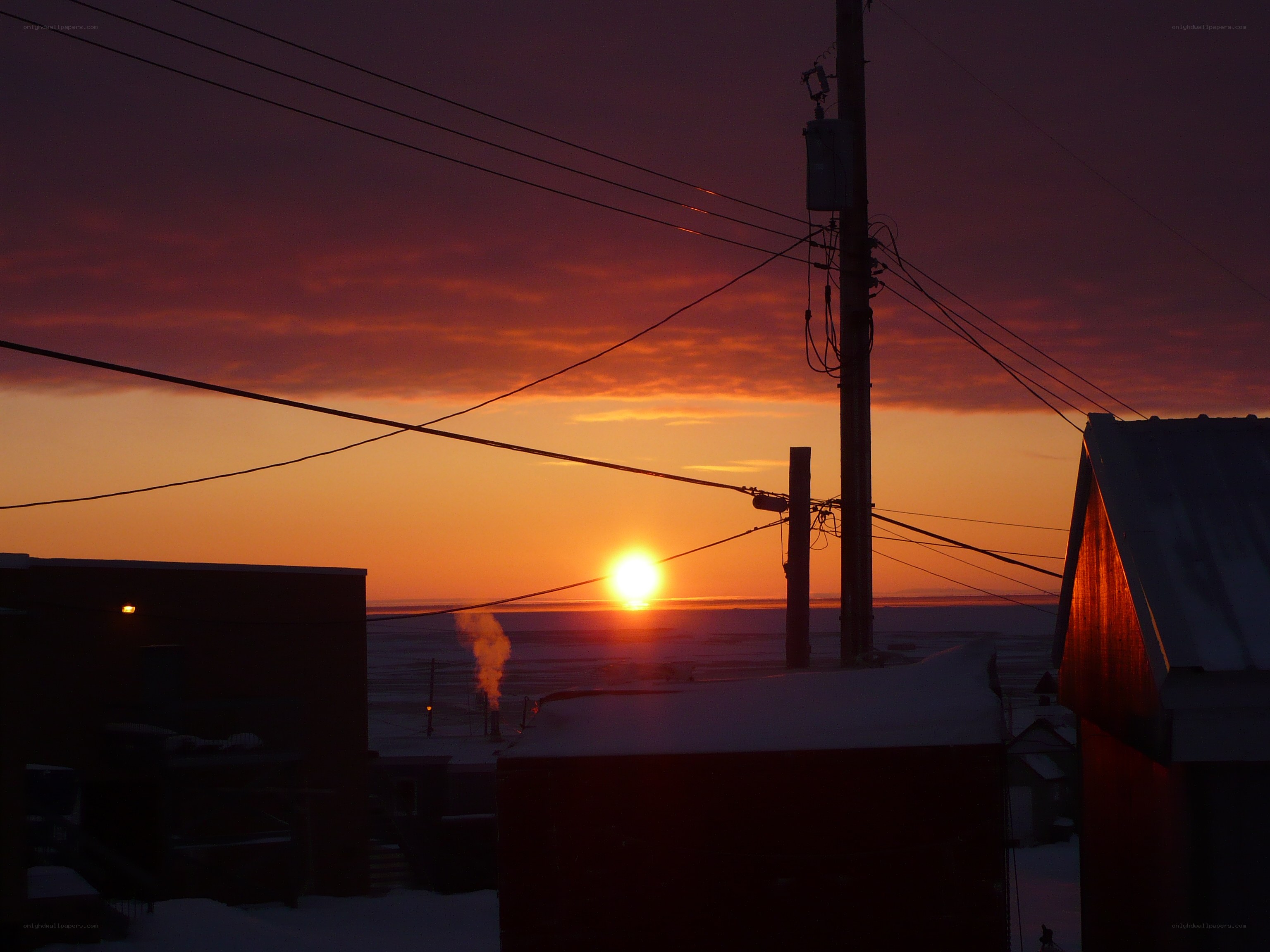 Sunset over a snowy town