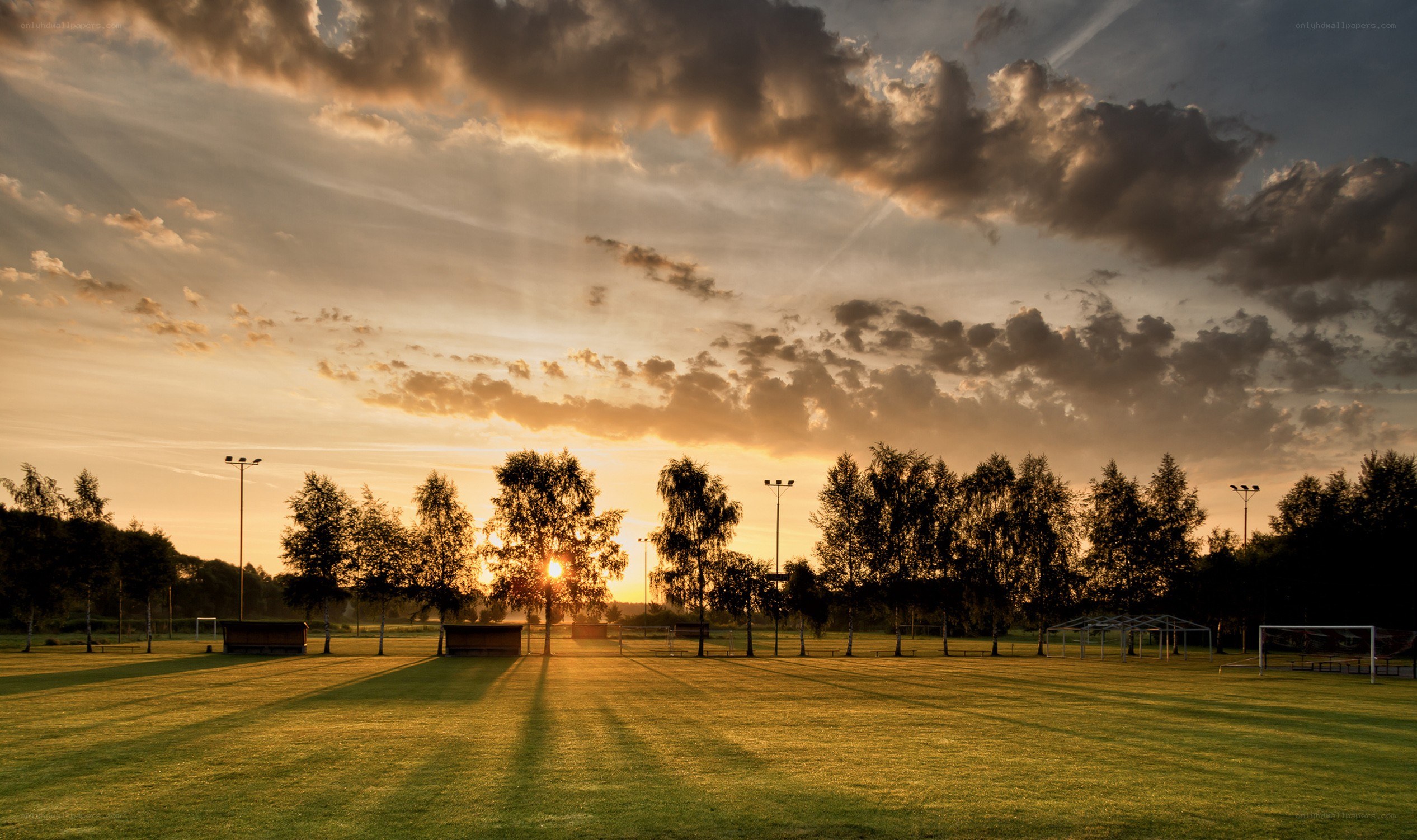Sunset over a sports field