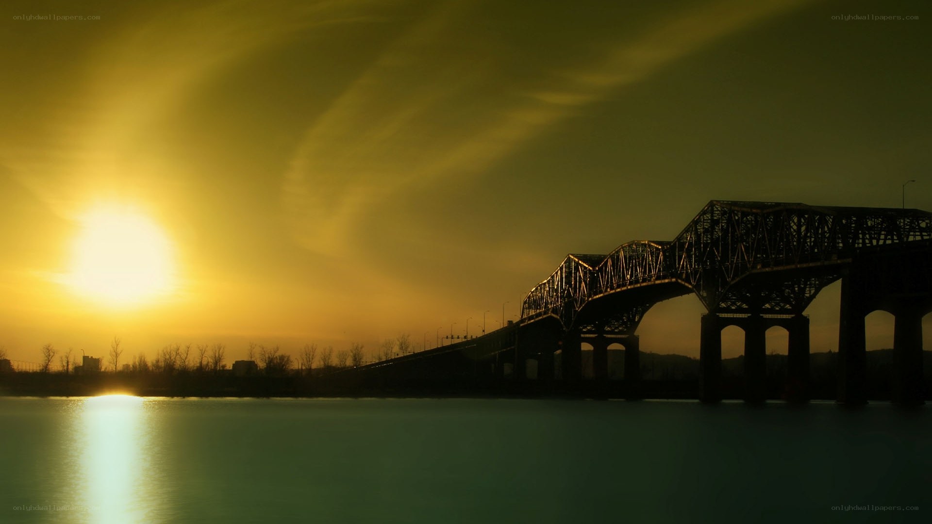 Sunset over a steel bridge