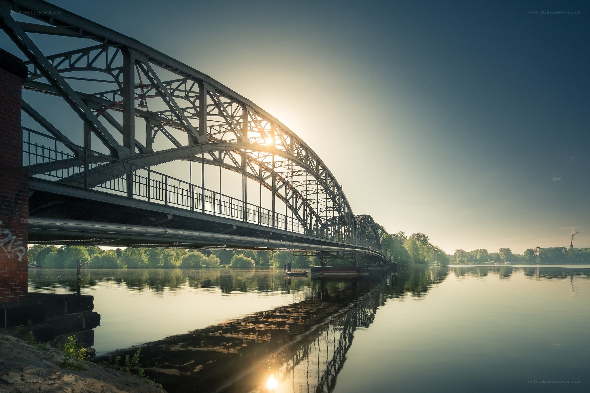 Sunset over a steel bridge