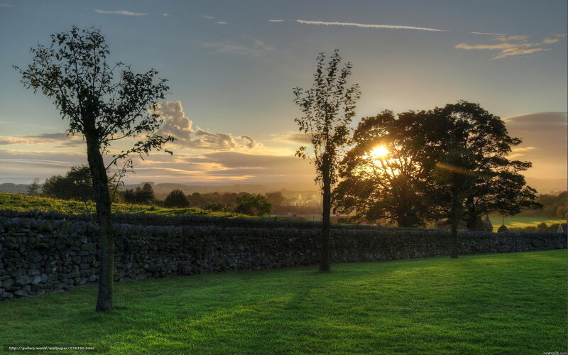 Sunset over a stone wall